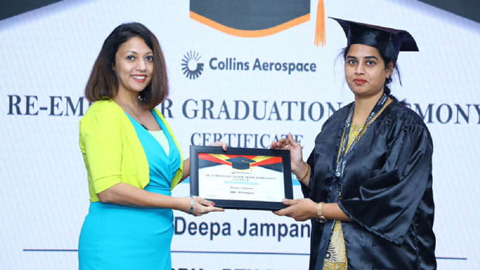 Deepa Jampana receives a diploma from the Re-Empower program