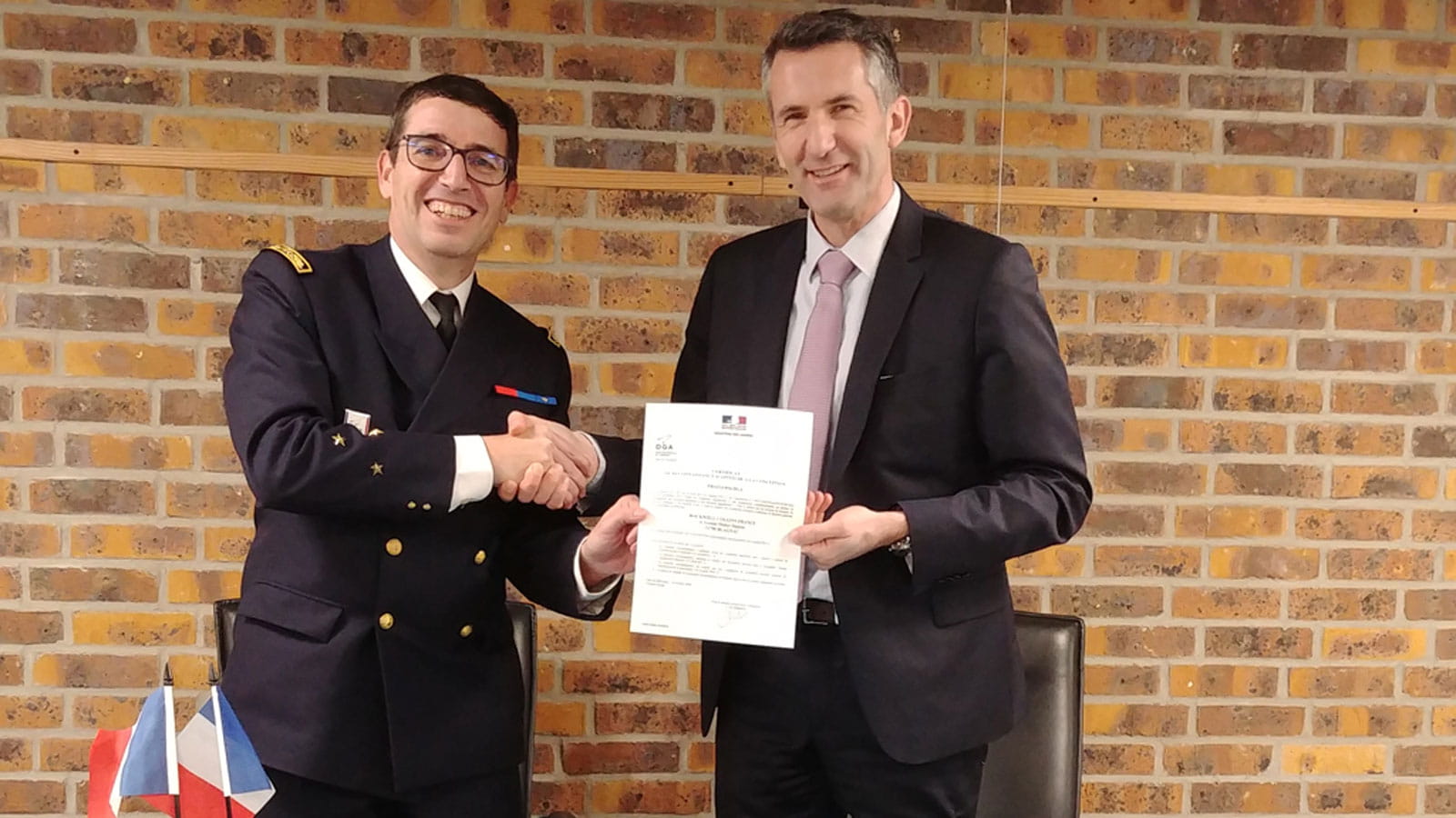 General Patrick Hadou, Ingénieur Général de l'Armement, head of DGA Authority and Olivier Pedron, managing director of Collins Aerospace Avionics in France, at the certification signing ceremony on Thursday, Jan. 24.