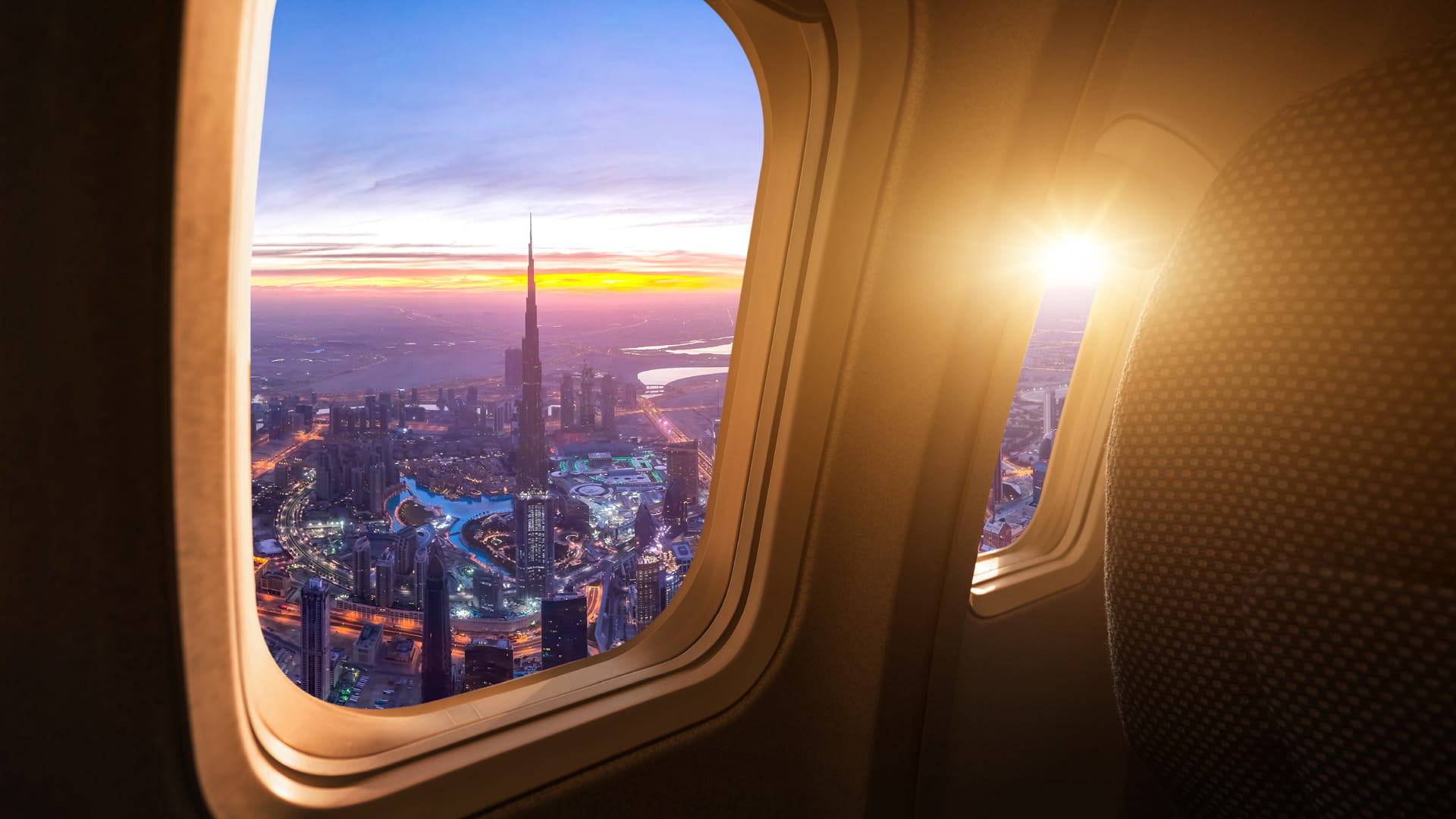 Dubai city scene outside airplane window