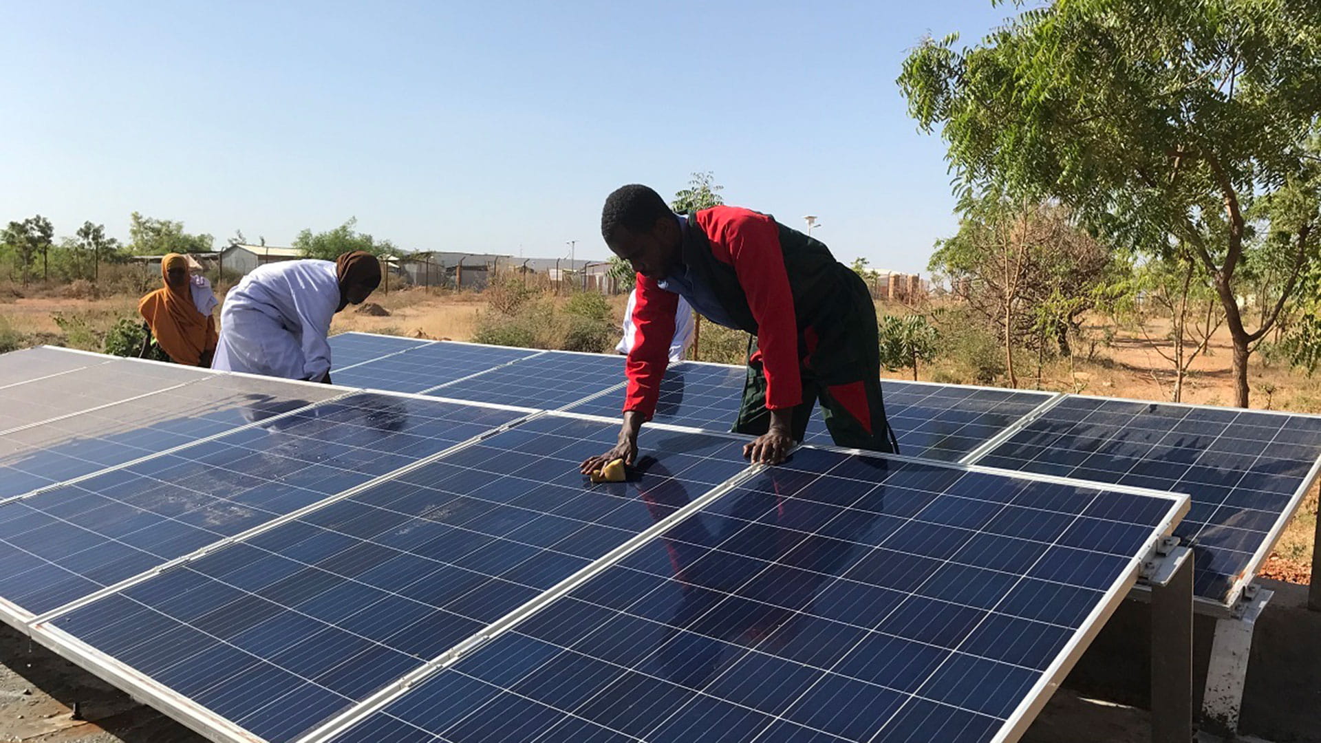 Lead Solar Technician cleans the panels to ensure they are absorbing as much sun
