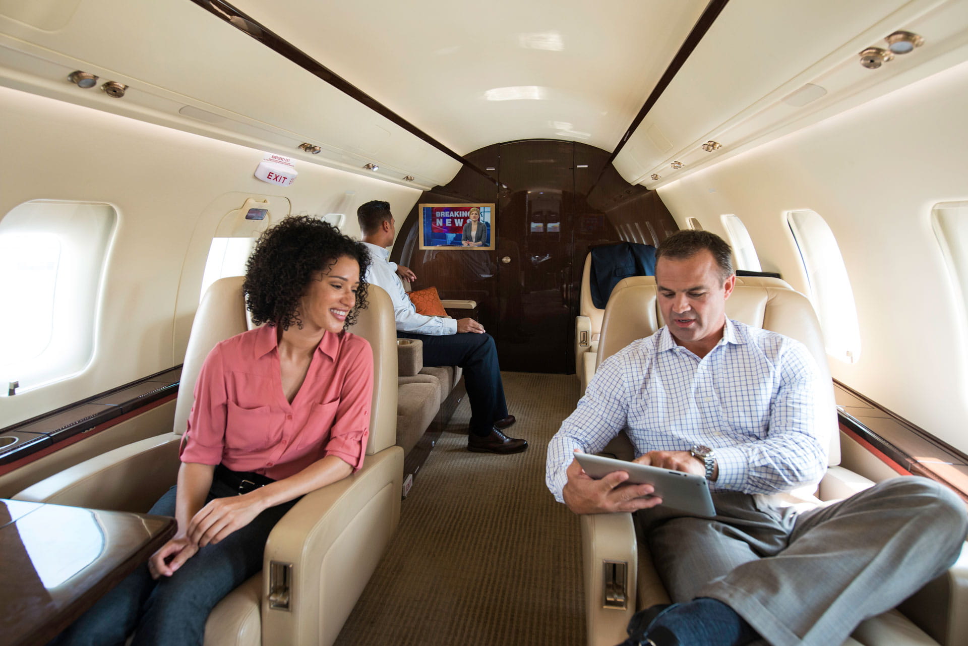 People in private jet conversing
