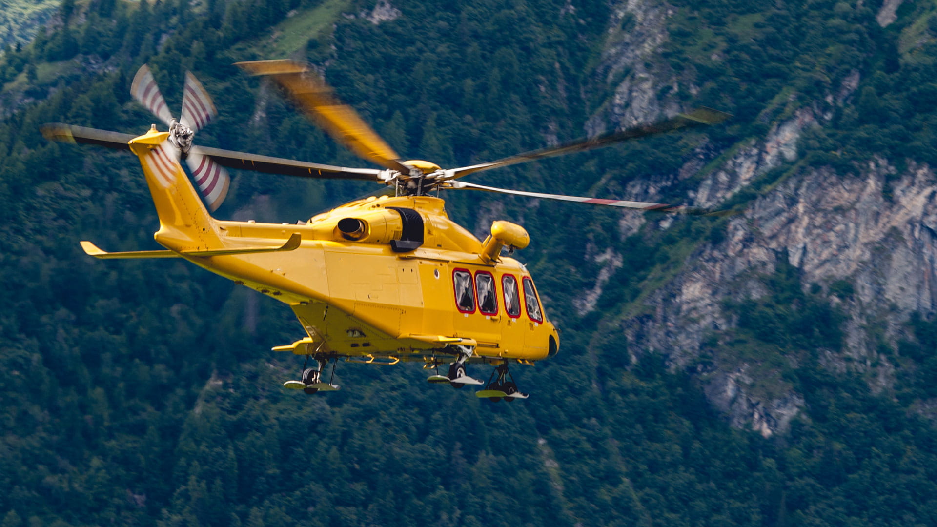 Yellow helicopter flying