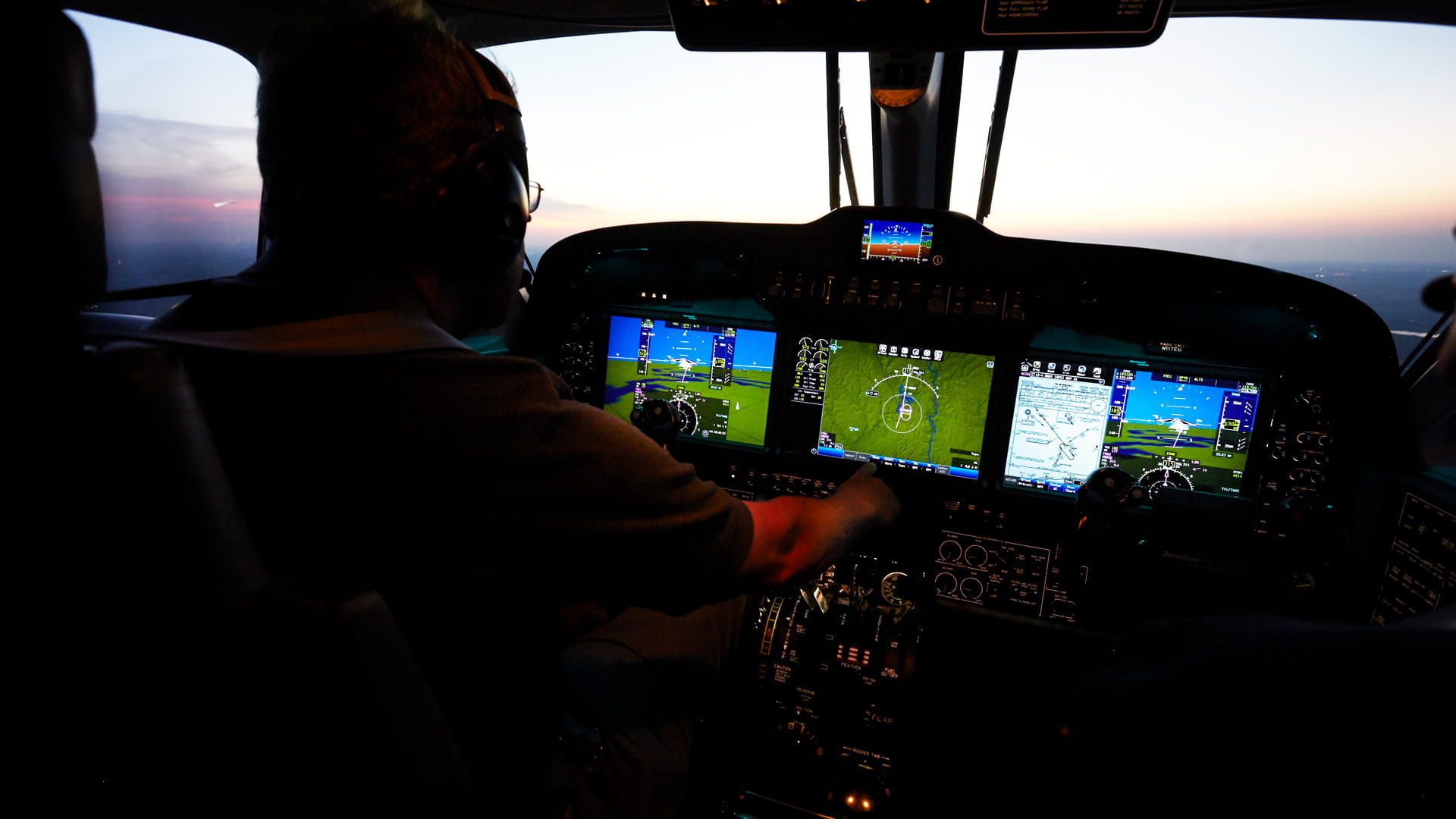 Pilot in plane cockpit