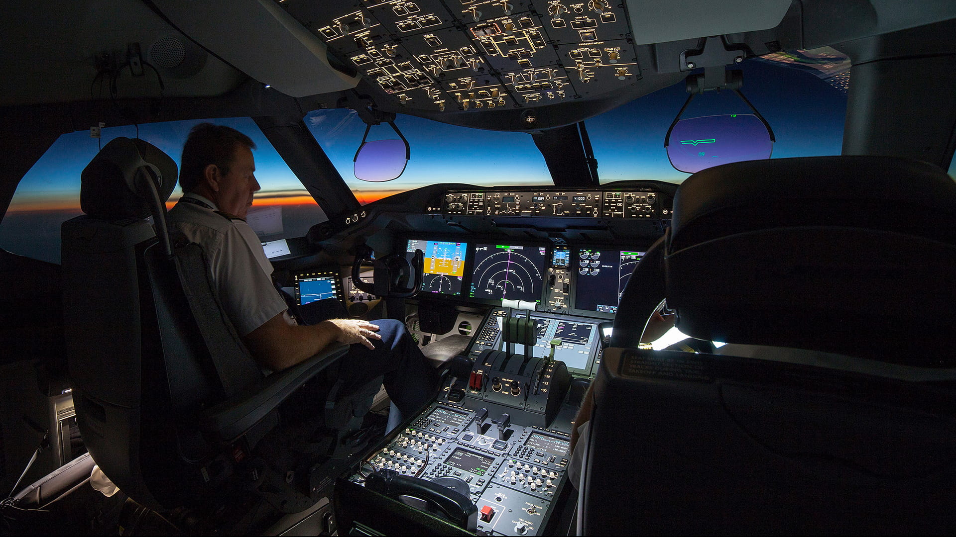 Pilot on a Boeing 787 flight deck
