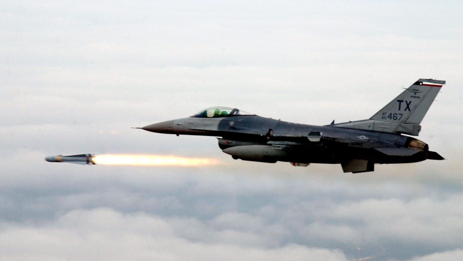 F-16 fighter jet firing missile