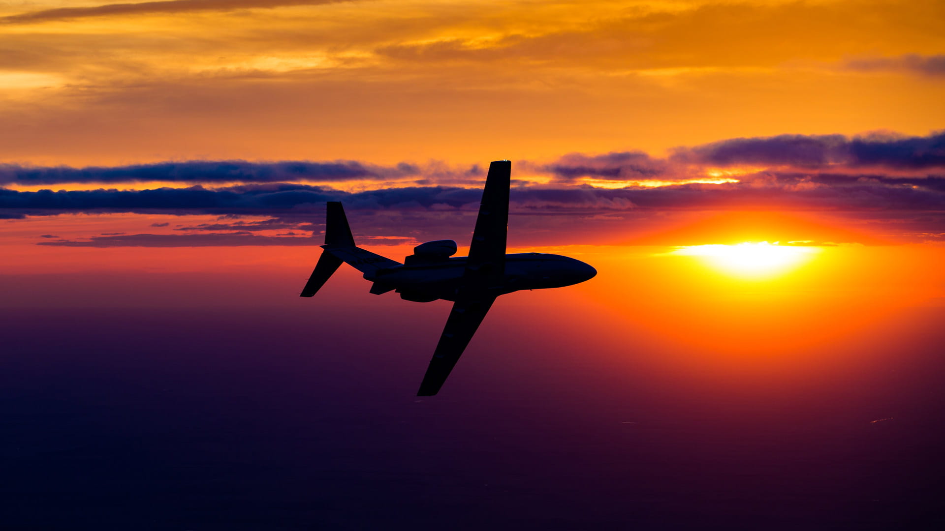 Business jet at sunset