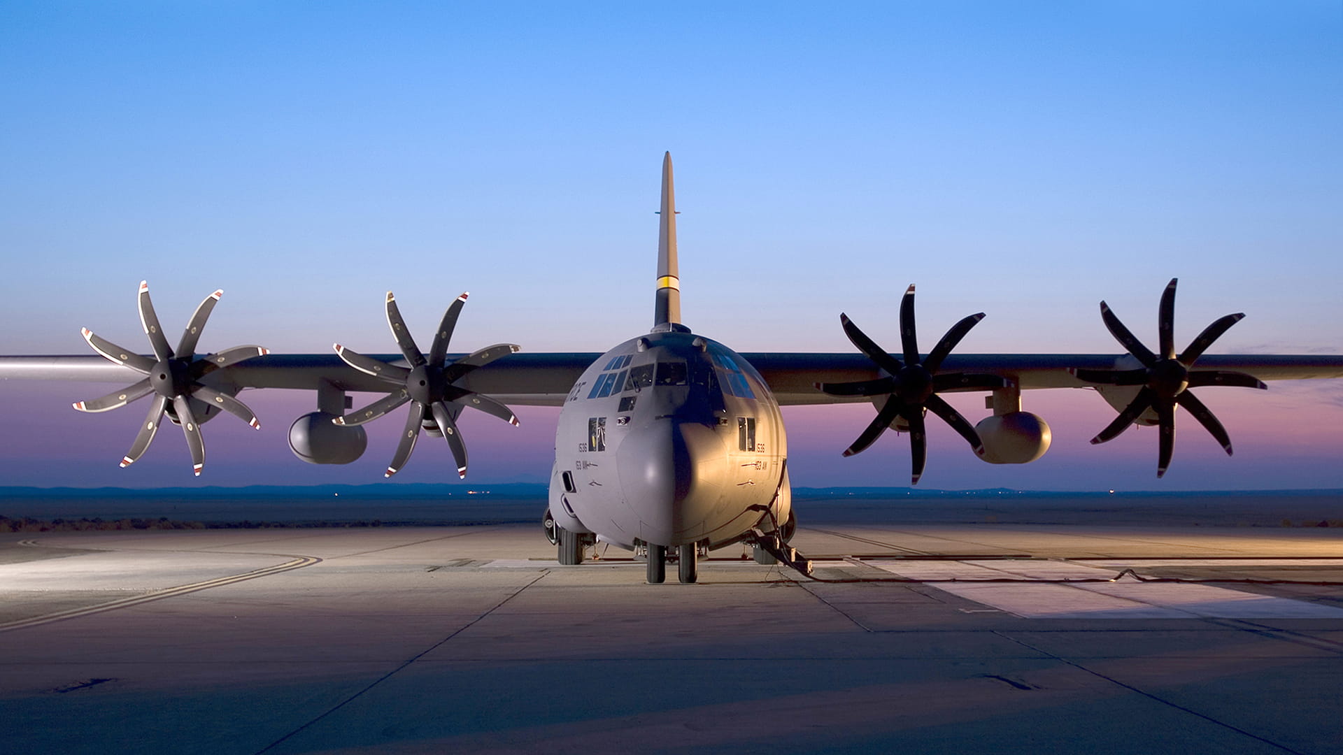 Military C-130 plane in night photography