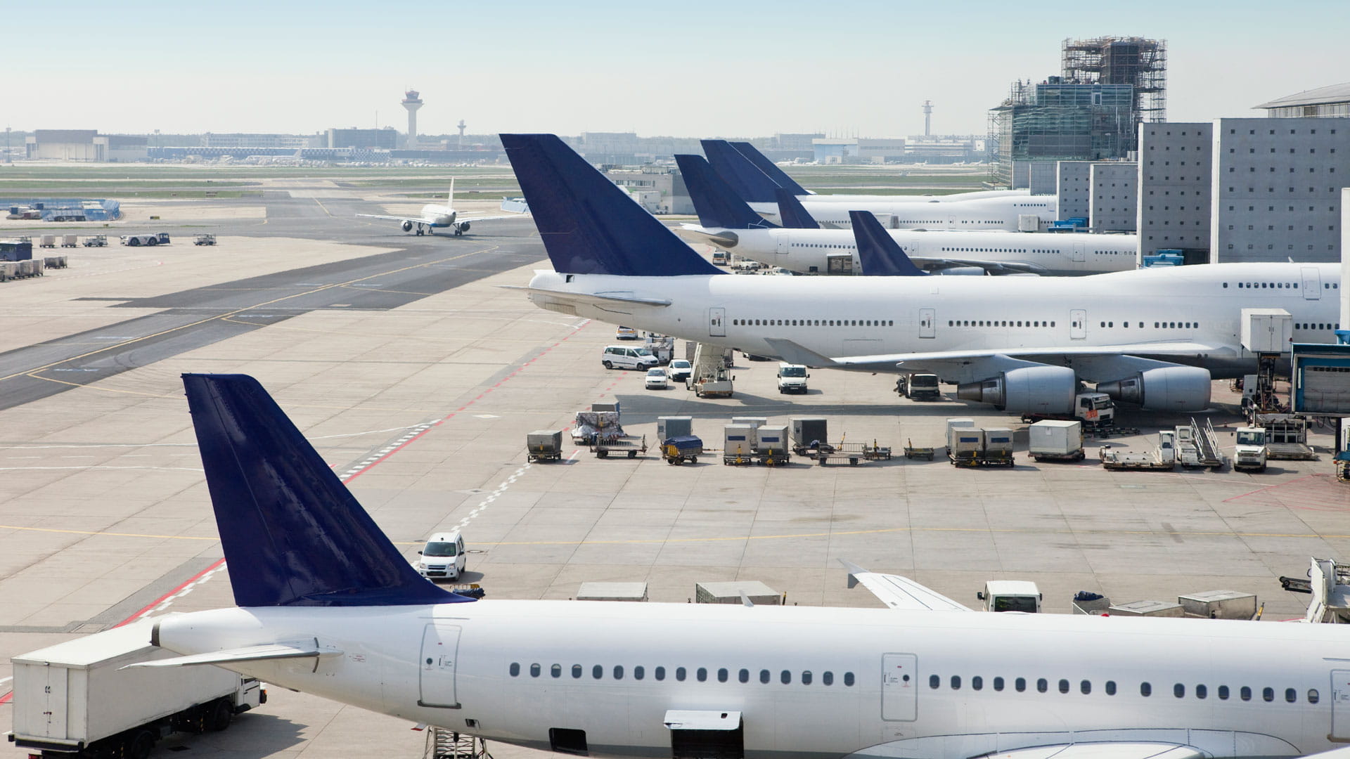Planes parked in airport terminal