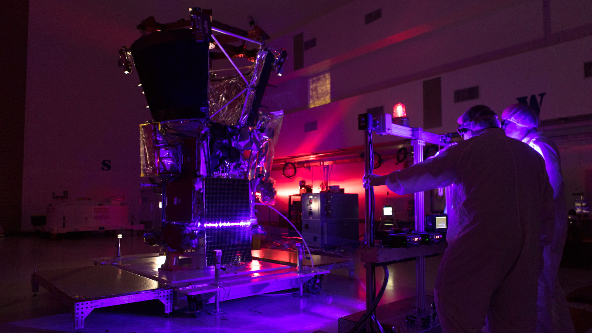 Two engineers testing the Parker Solar Probe