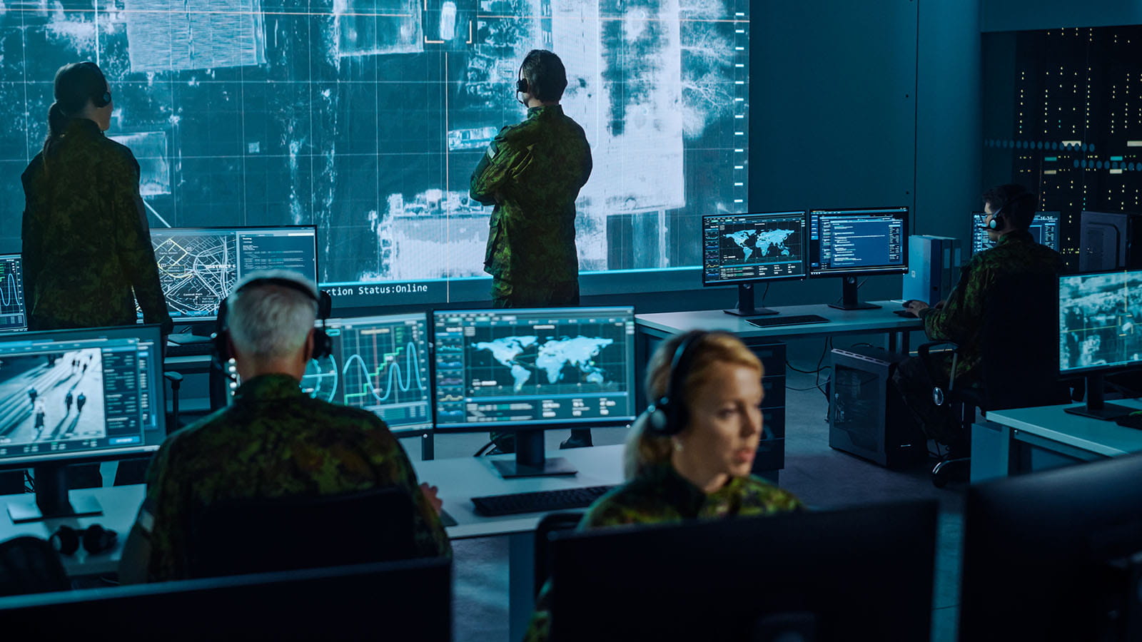 military personnel at computer stations 