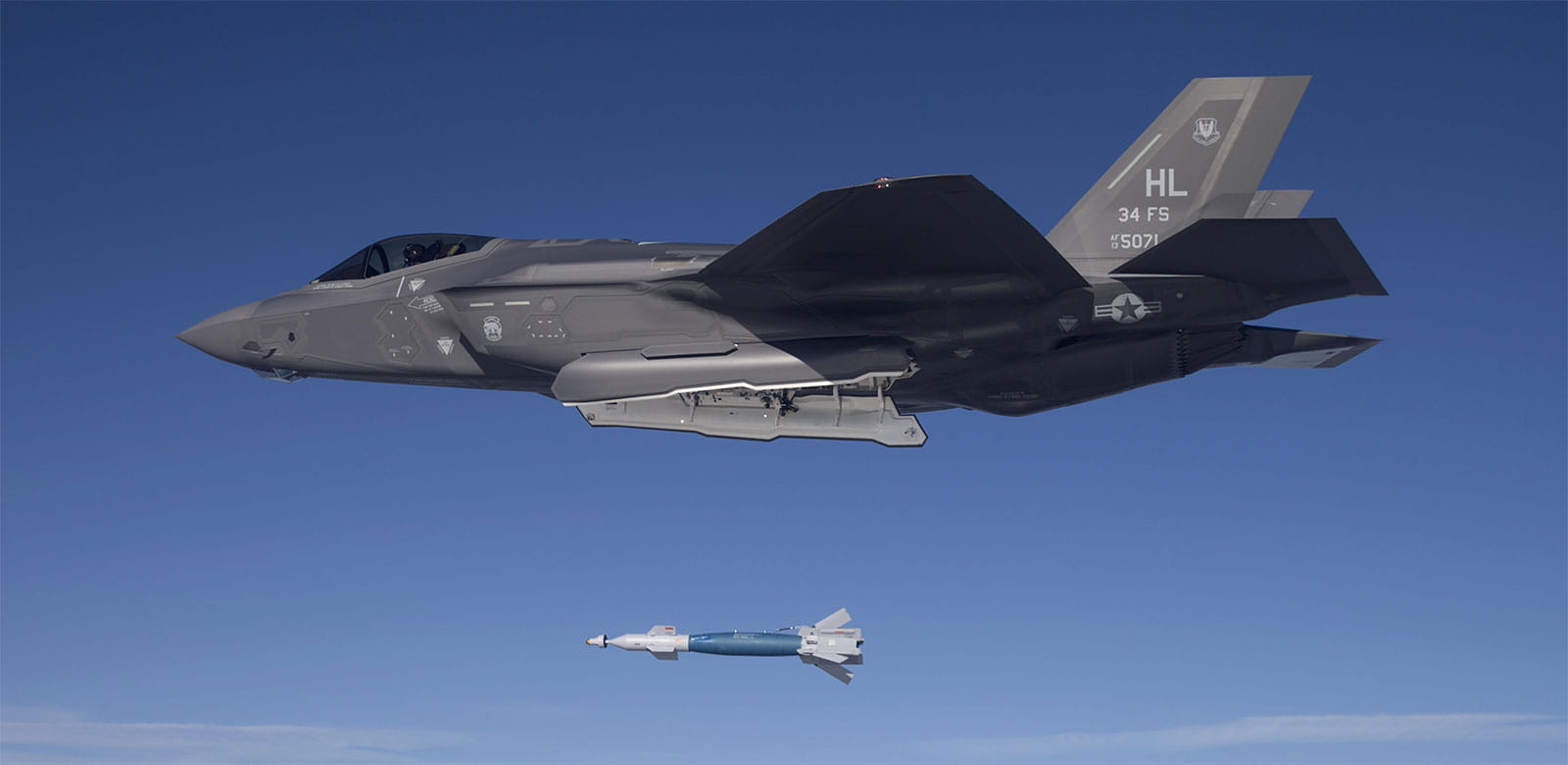 F35 fighter jet launching a Paveway laser guided missile.