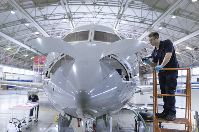 An engineer in Broughton carries out routine maintenance checks on Sentinel Mk1 aircraft