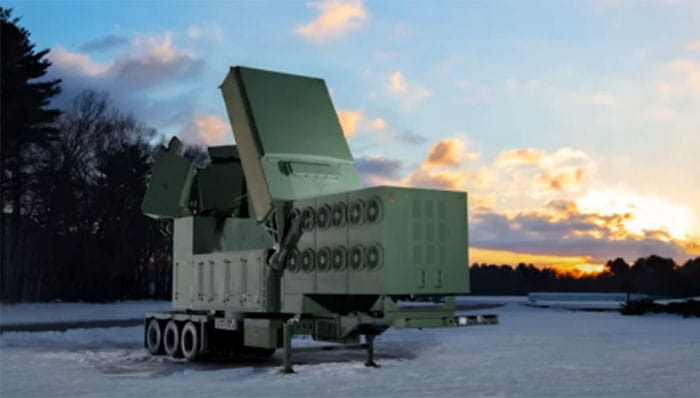 LTAMDS launcher sitting on snow covered ground with sunset in the background