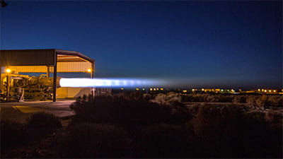 Blue flame of a military engine being tested at night