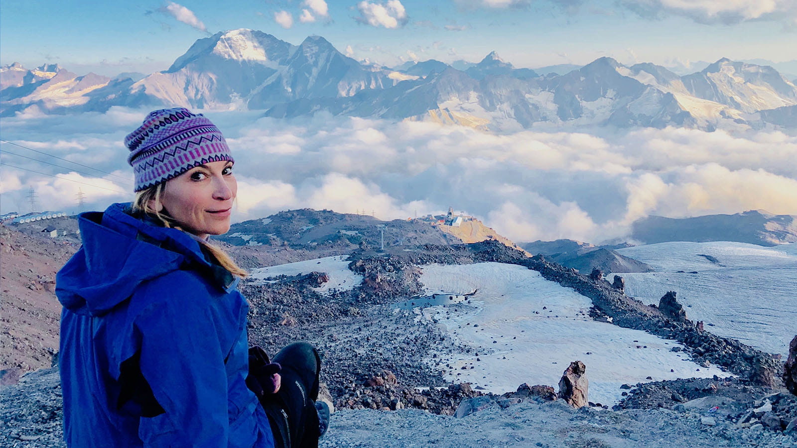 Buchanan takes in the view above the clouds of the 18,510-foot Mount Elbrus, Russia, as she prepares for a 2 a.m. summit day start in August 2018.