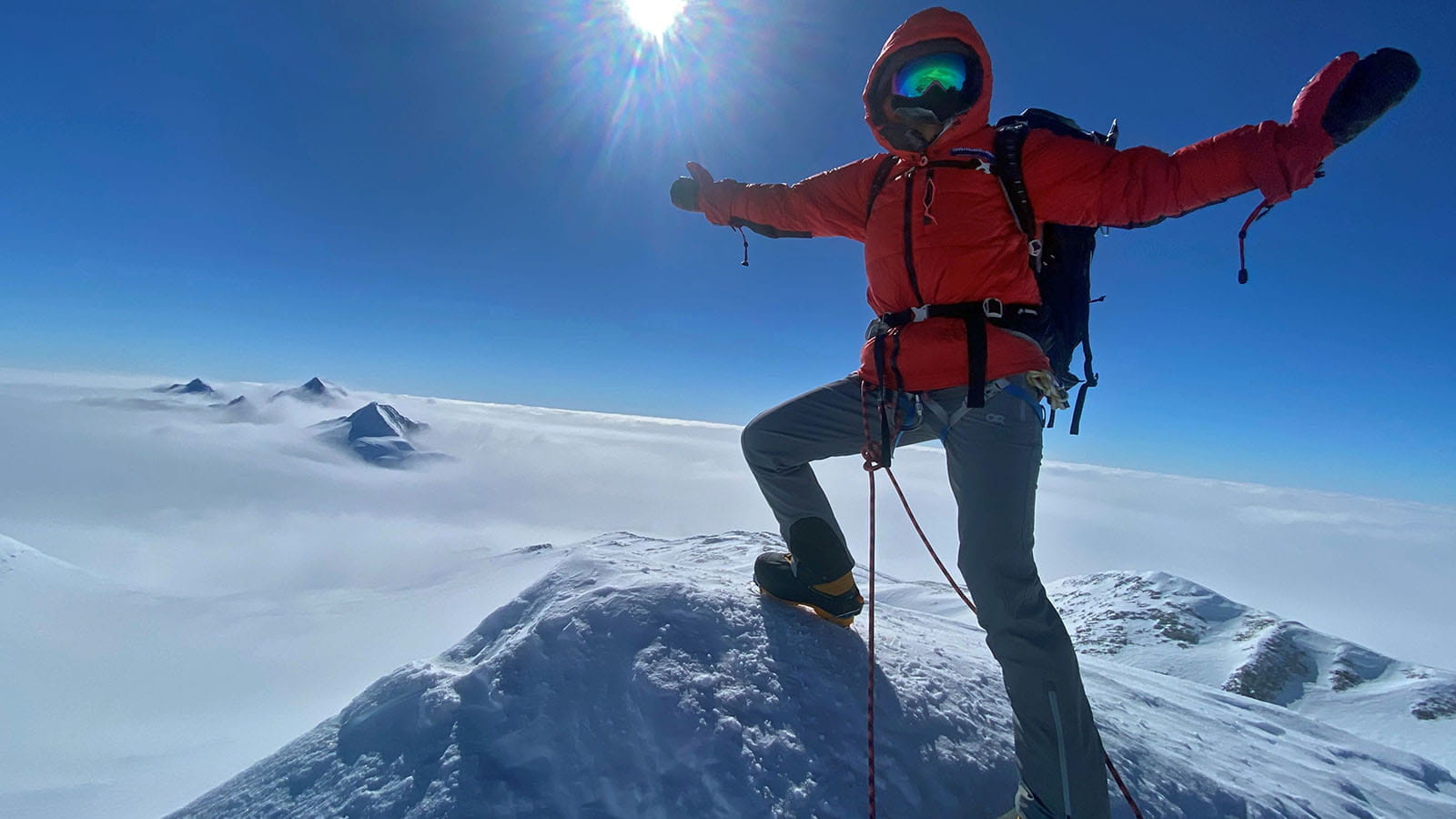 Buchanan stands on the summit of Vinson Massif, Antarctica